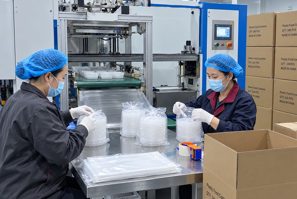 Precision machinery for disposable food container manufacturing