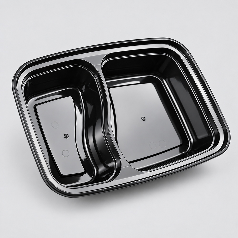 Open black two-compartment container base, top view
