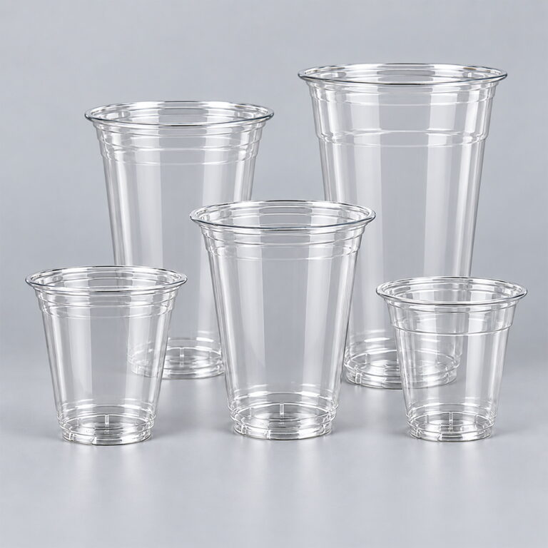 Five clear PET cups in different sizes on grey background