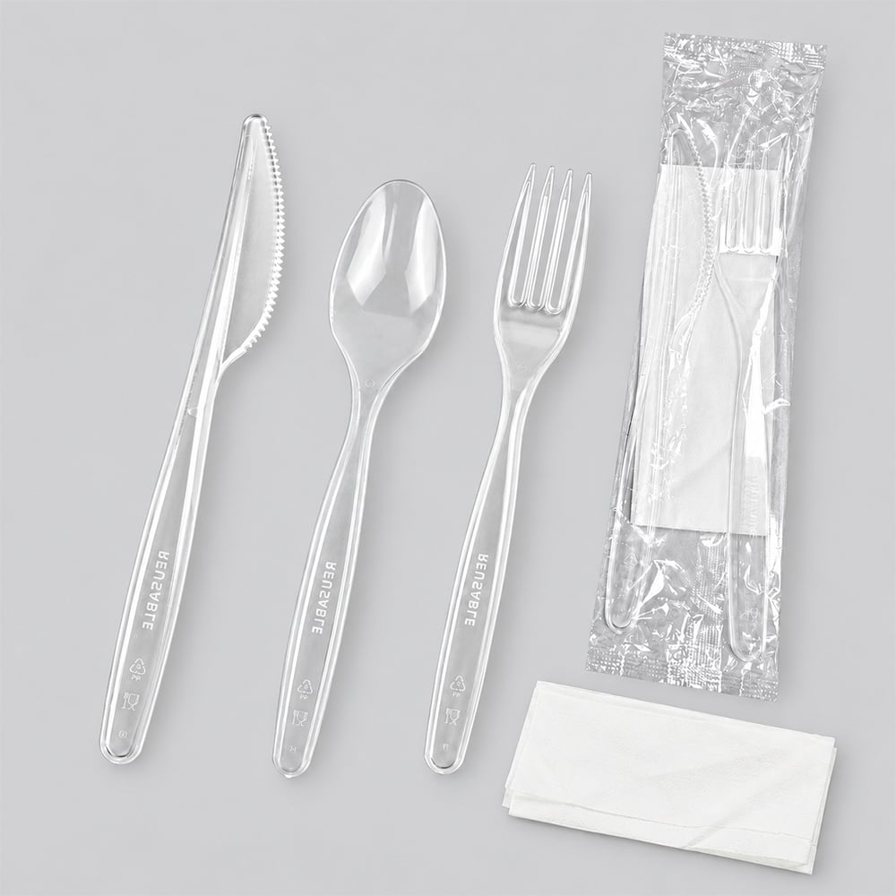 Clear plastic knife, spoon and fork with wrapped kit and napkin