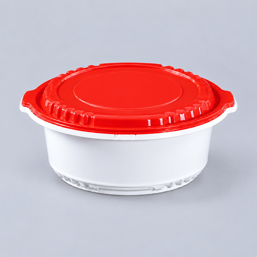 Side view of white round bowl with red ribbed lid